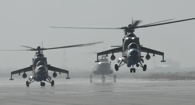 Military helicopters on tarmac