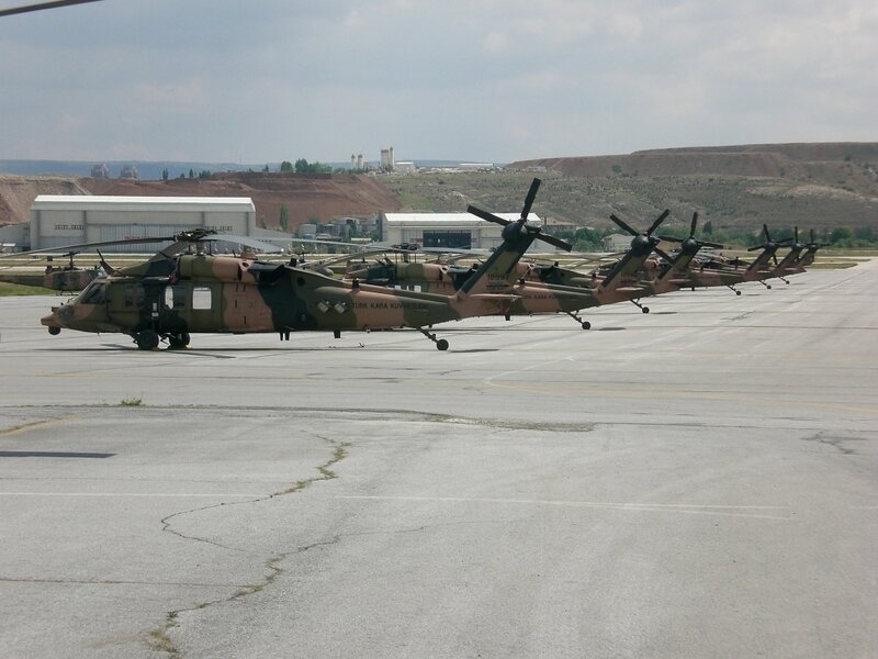Military helicopters on tarmac
