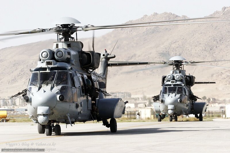 Military helicopters on tarmac