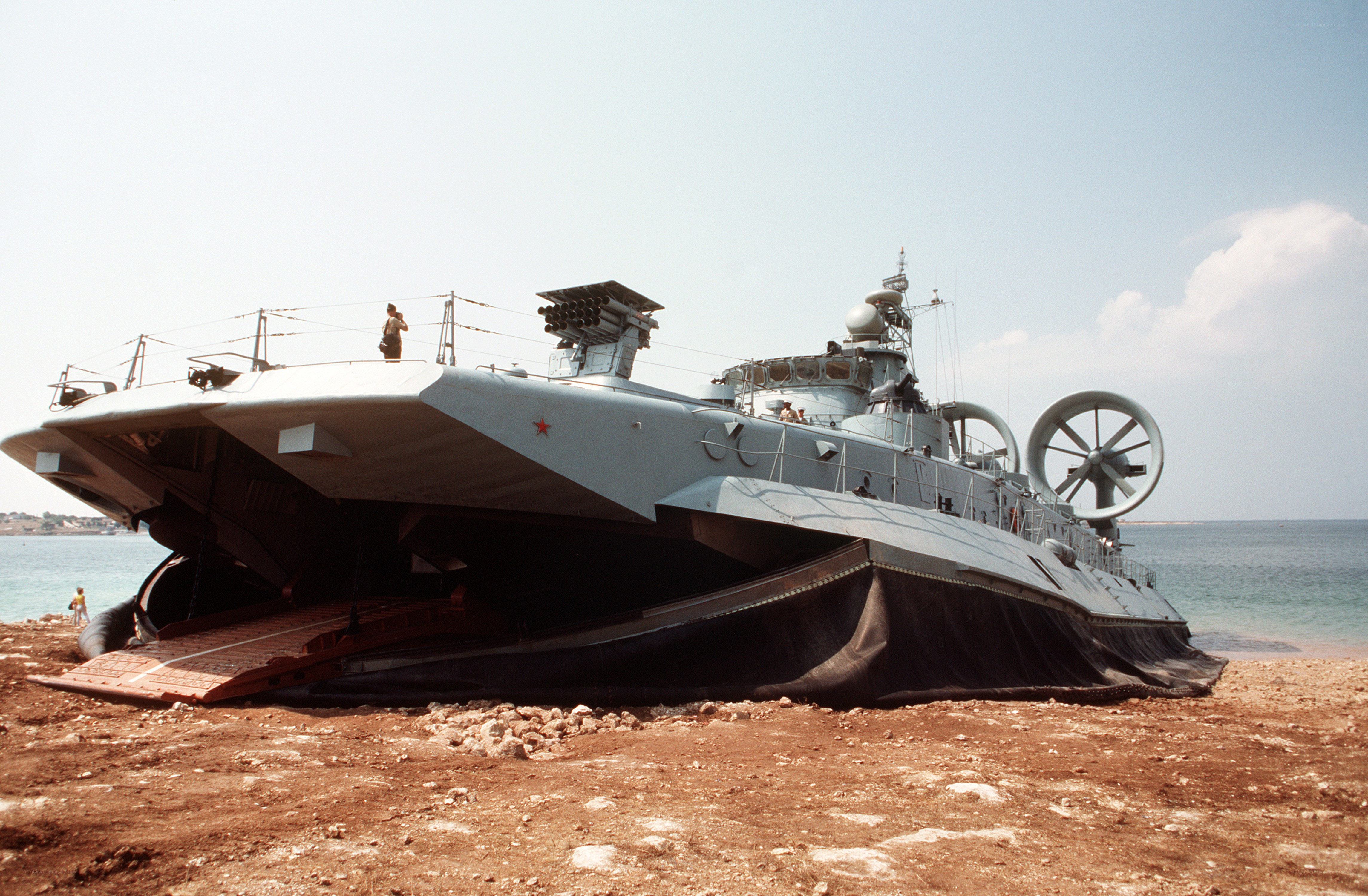 Military hovercraft on beach