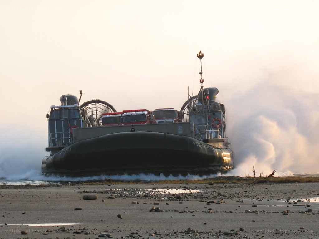 Military hovercraft on shore