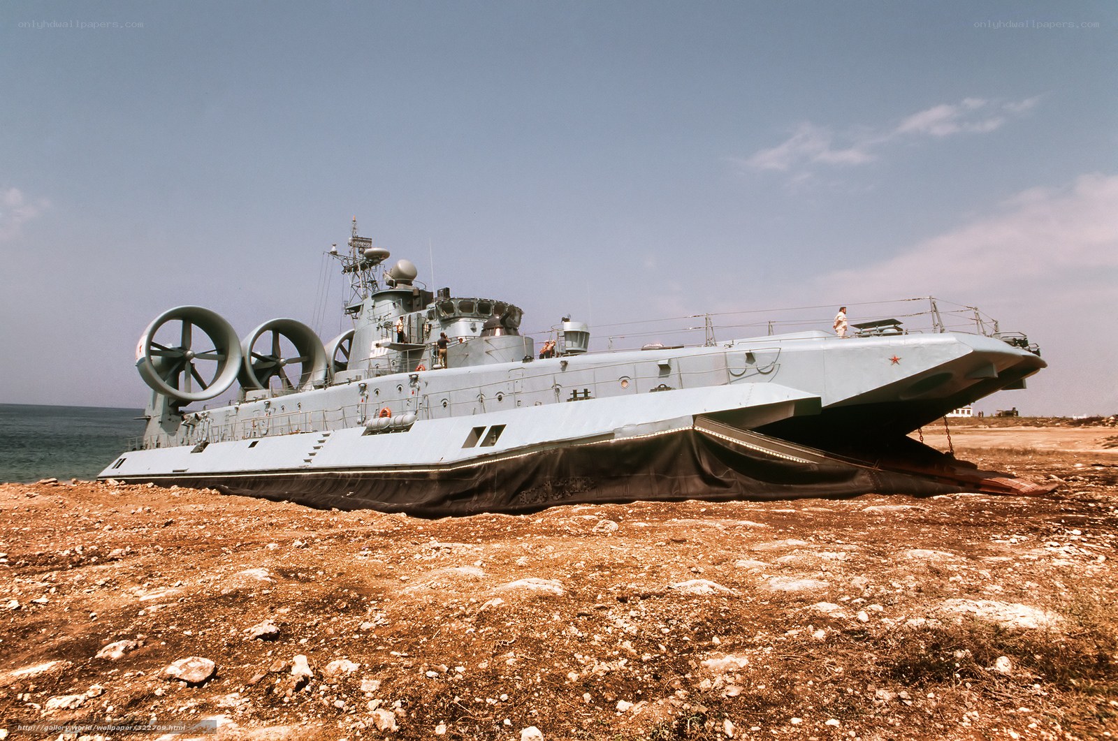 Military hovercraft on shore
