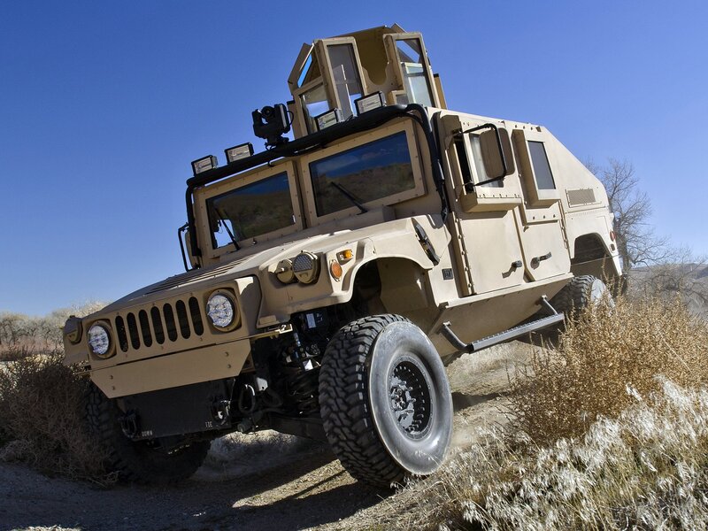 Military Humvee in desert terrain