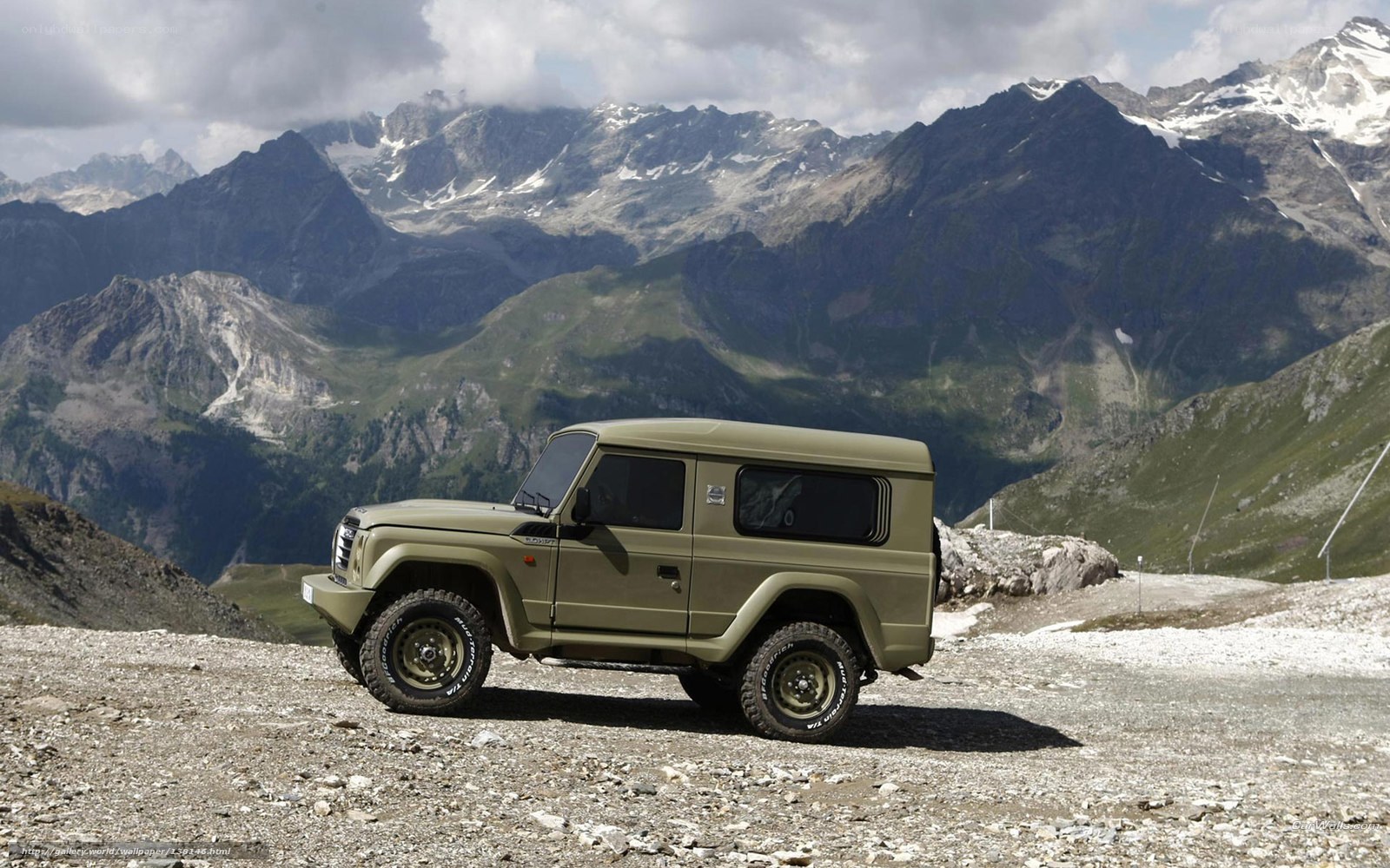 military jeep in mountain landscape