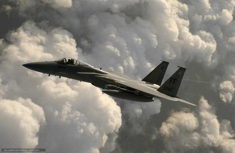 Military Jet in Clouds