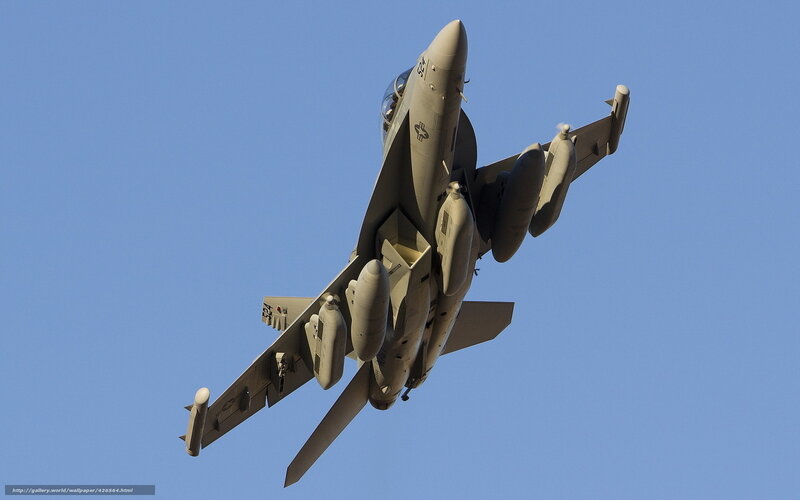 Military Jet in Flight — Blue, Dynamic, Afternoon, Photograph, Aircraft, Sky, Weapons