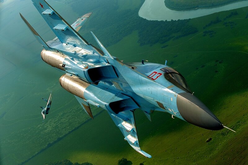 Military Jet in Flight — Blue, Dynamic, Afternoon, Photograph, Green Landscape