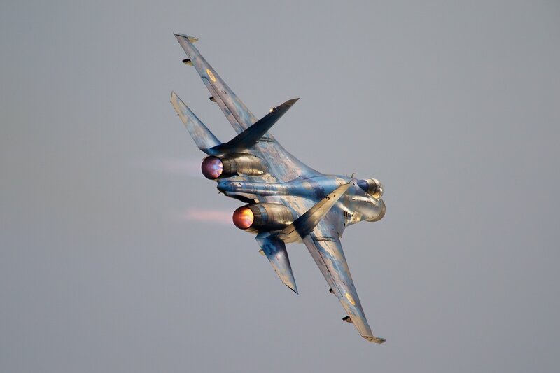 Military Jet in Flight — Blue, Dynamic, Sunset