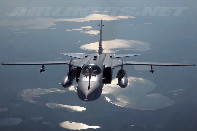 Military Jet in Flight — Gray, Aerial, Afternoon, Photograph, Aircraft, Islands
