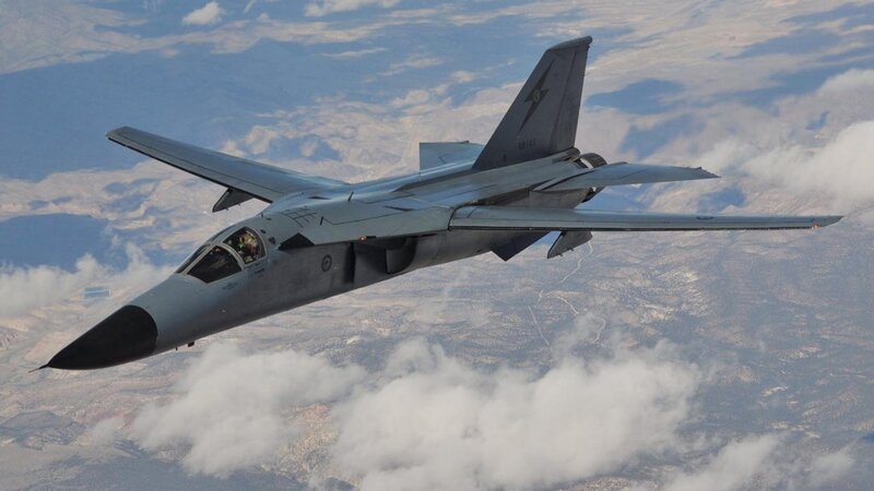 Military Jet in Flight — Gray, Dramatic, Afternoon, Photograph, Clouds