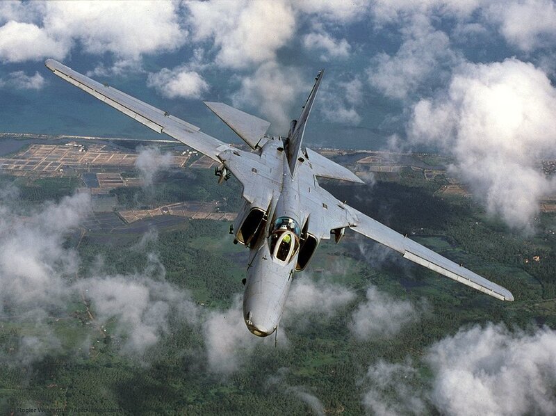 Military Jet in Flight — Gray, Dramatic, Afternoon