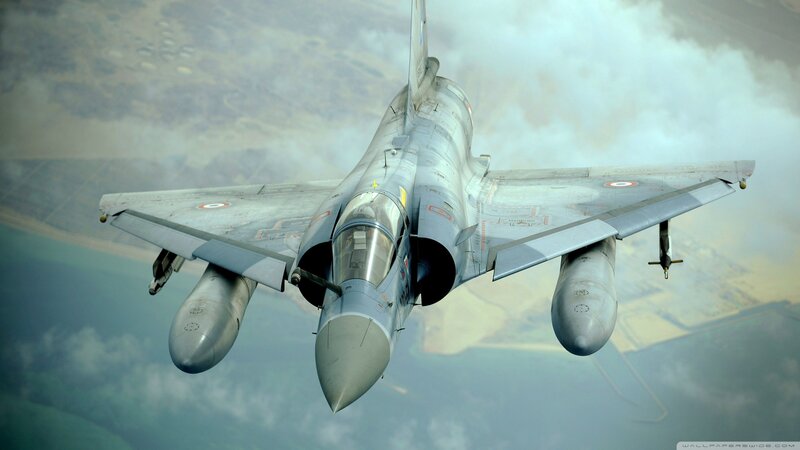 Military Jet in Flight — Gray, Dramatic, Photograph, Aircraft, Clouds, Ground