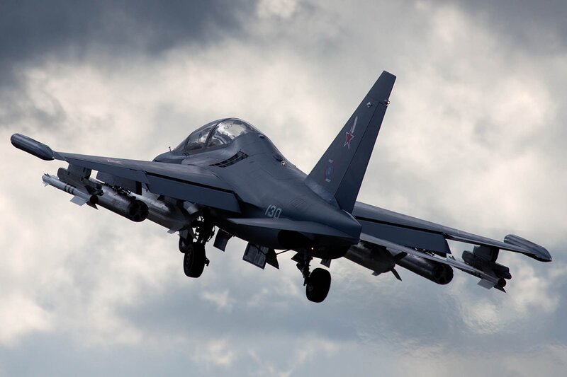 Military Jet in Flight — Gray, Dramatic, Photograph, Clouds, Missiles, Landing Gear