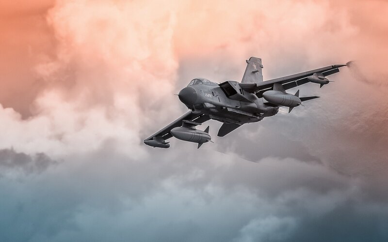 Military Jet in Flight — Gray, Dramatic, Sunset, Photograph, Clouds
