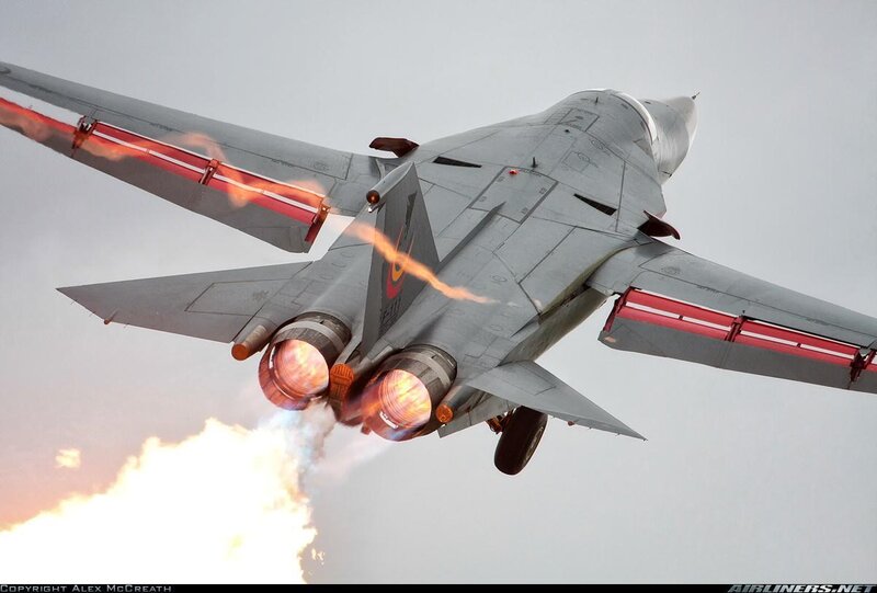 Military Jet in Flight — Gray, Dramatic, Sunset