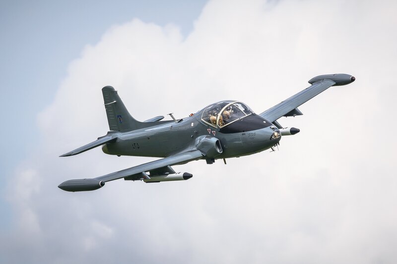 Military Jet in Flight — Gray, Dynamic, Afternoon, Photograph, Aircraft, Clouds, Pilot