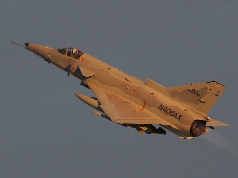 Military Jet in Flight — Gray, Dynamic, Sunset
