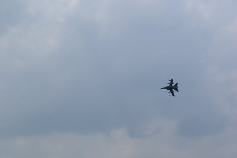 Military Jet in Flight — Gray, Overcast, Photograph, Aircraft