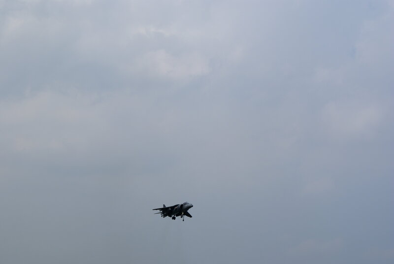 Military Jet in Flight — Gray, Overcast, Photograph