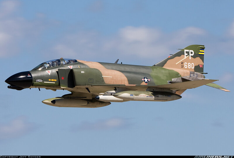 Military Jet in Flight — Green, Calm, Afternoon, Photograph, Aircraft, Missile