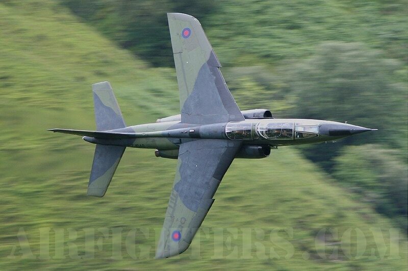 Military Jet in Flight — Green, Dynamic, Afternoon