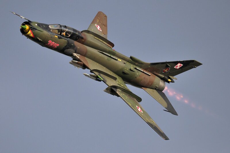 Military Jet in Flight — Green, Dynamic, Photograph, Sky