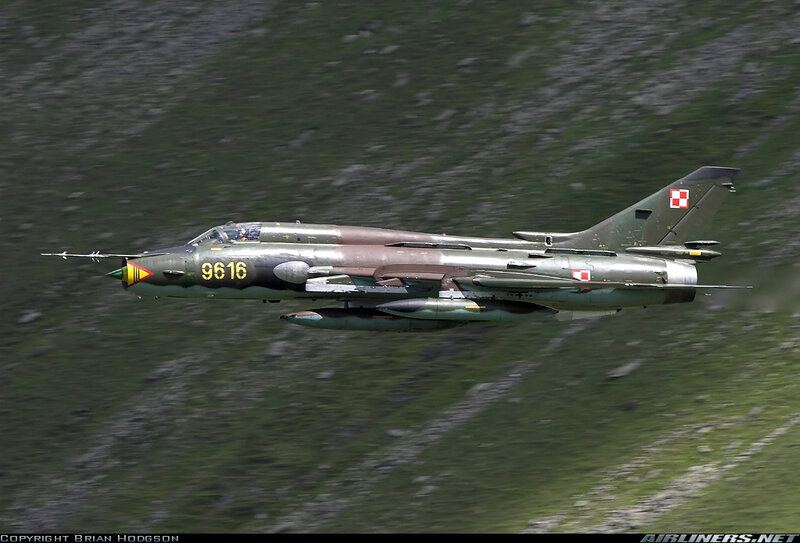 Military Jet in Flight — Green, Dynamic, Photograph
