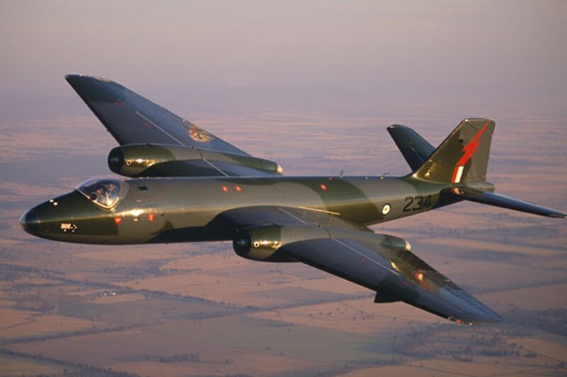 Military Jet in Flight — Green, Serene, Sunset
