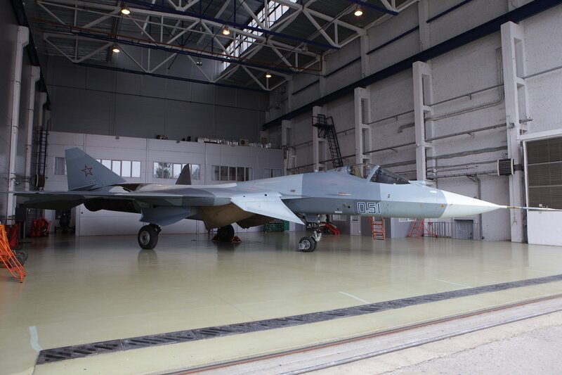 Military Jet in Hangar — Gray, Industrial