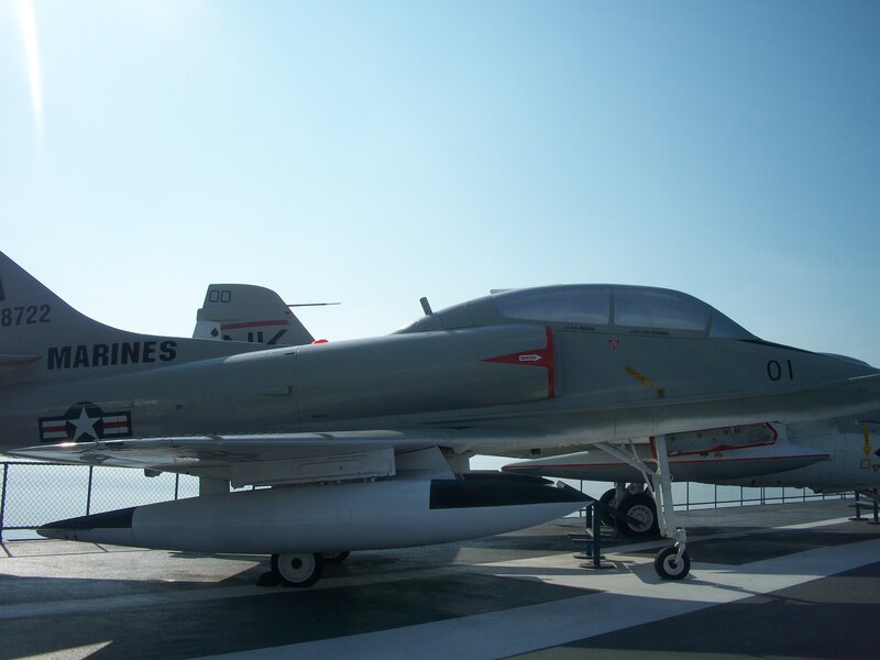 Military Jet on Aircraft Carrier — Gray