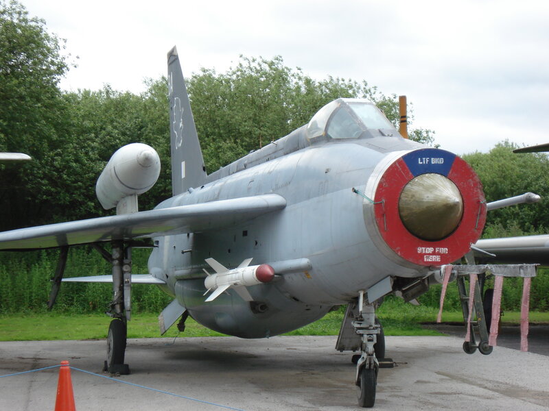 Military Jet on Display — Gray, Neutral, Afternoon
