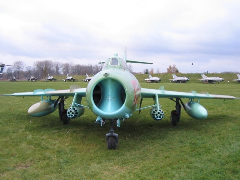 Military Jet on Display — Green, Overcast
