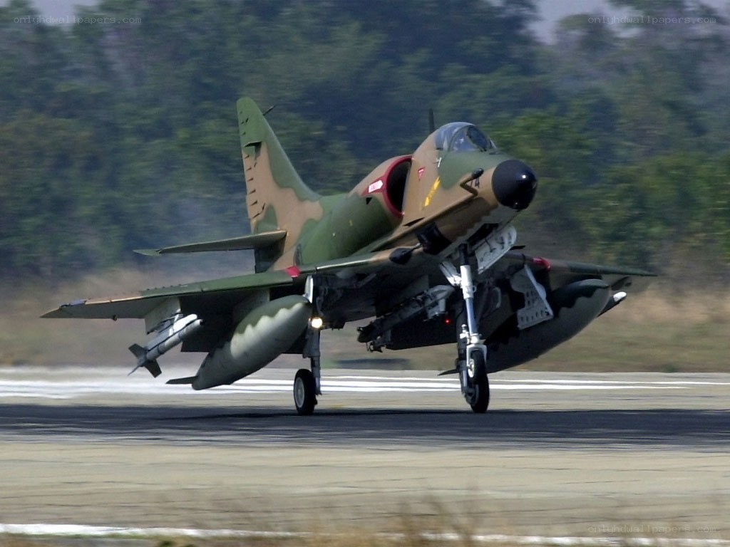 military jet on runway