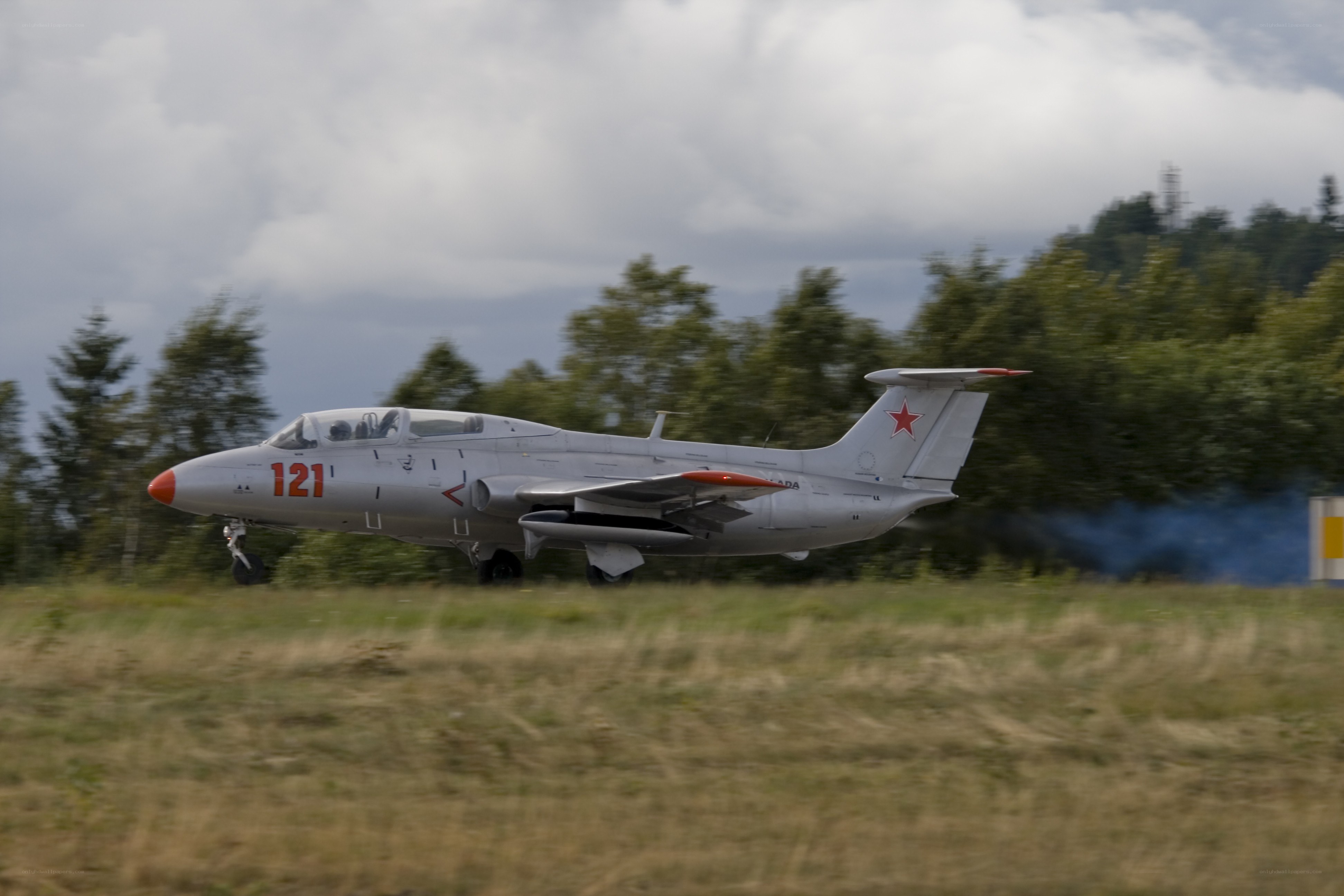military jet on runway