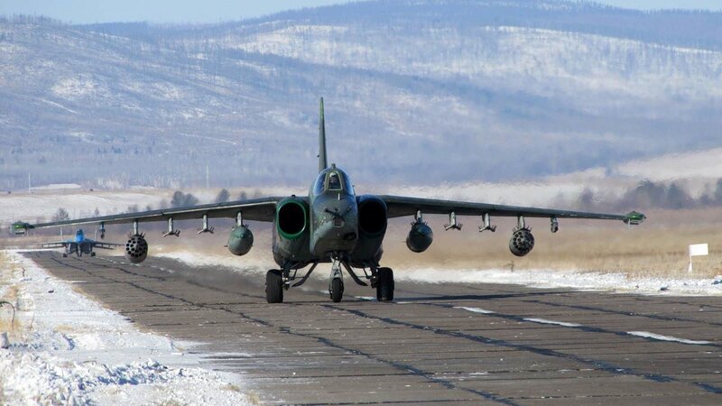 military jet on runway