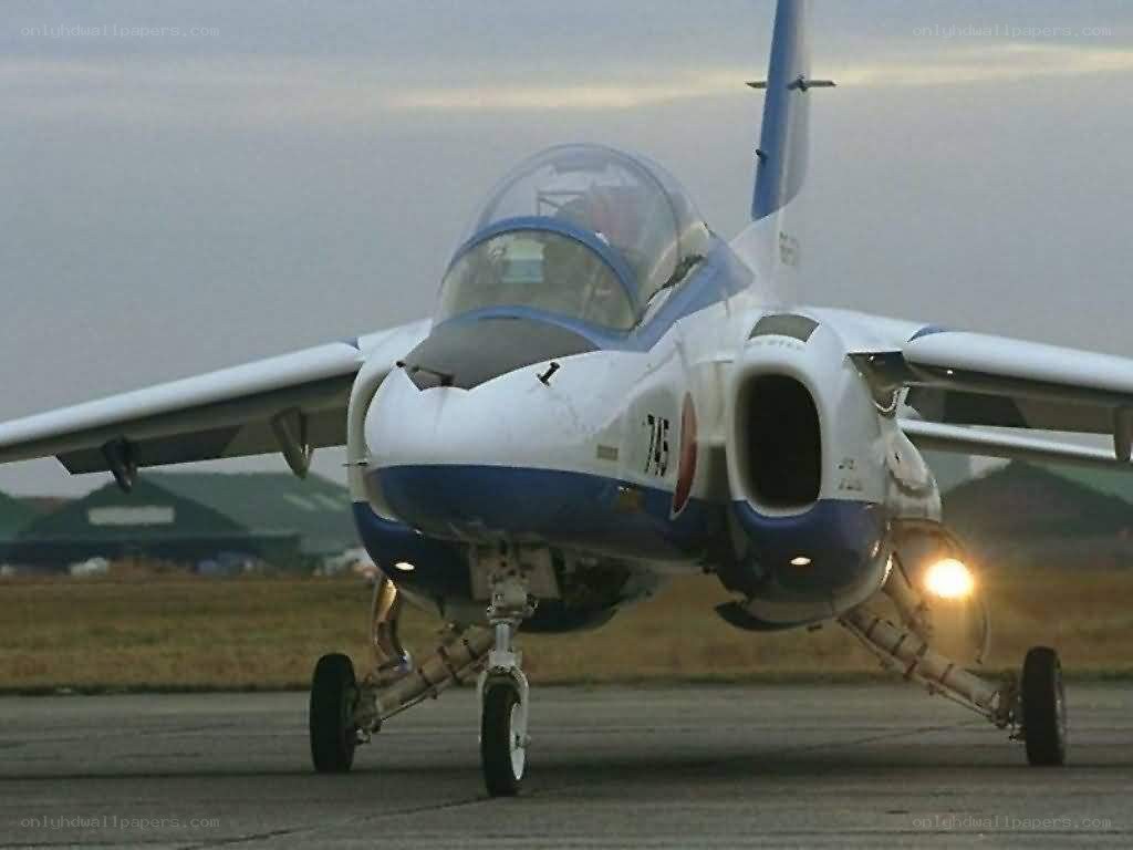 military jet on runway