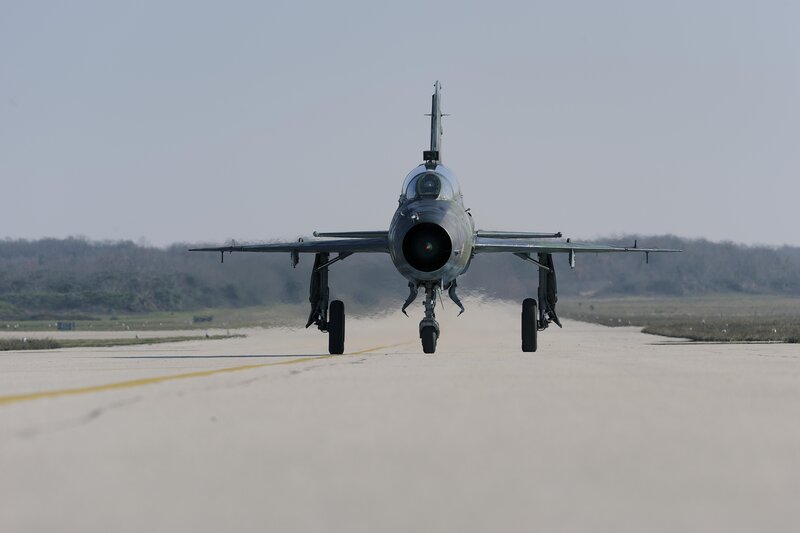 Military Jet on Runway — Gray, Calm, Afternoon, Photograph