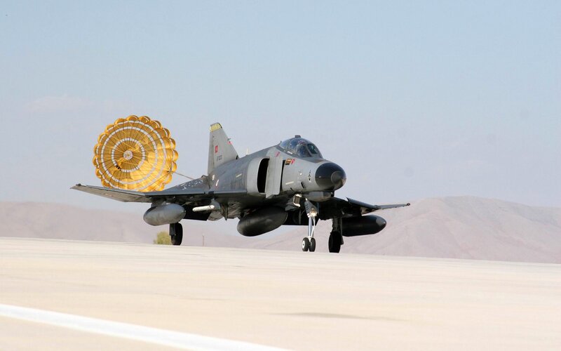 Military Jet on Runway — Gray, Calm, Afternoon