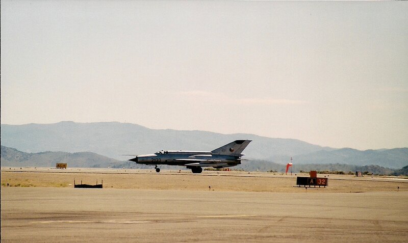 Military Jet on Runway — Gray, Calm