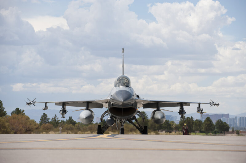Military Jet on Runway — Gray, Dramatic, Afternoon, Photograph, Clouds