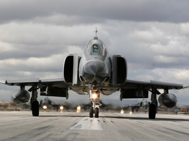 Military Jet on Runway — Gray, Dramatic, Photograph