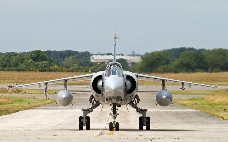 Military Jet on Runway — Gray, Neutral, Afternoon, Photograph, Trees