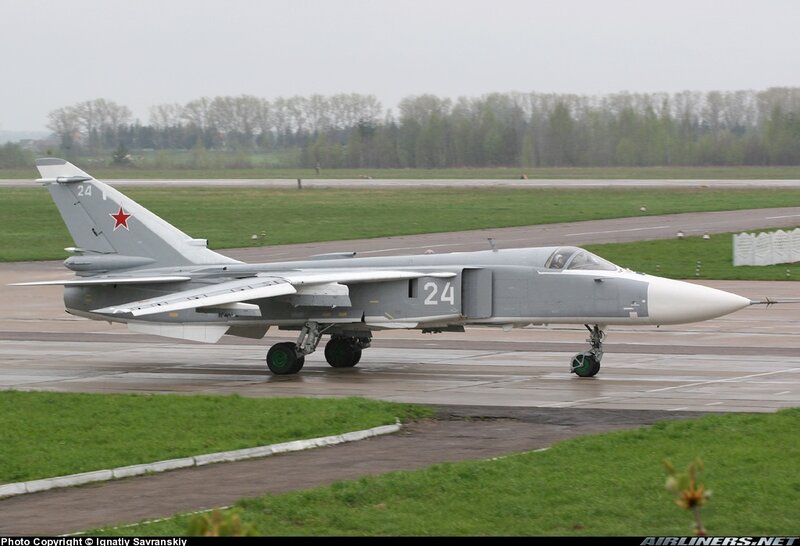 Military Jet on Runway — Gray, Overcast
