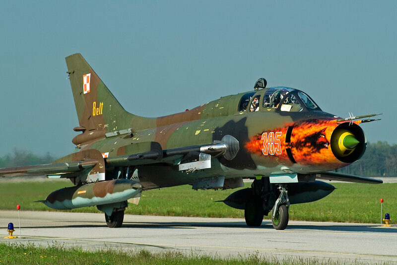 Military Jet on Runway — Green, Calm, Afternoon, Photograph
