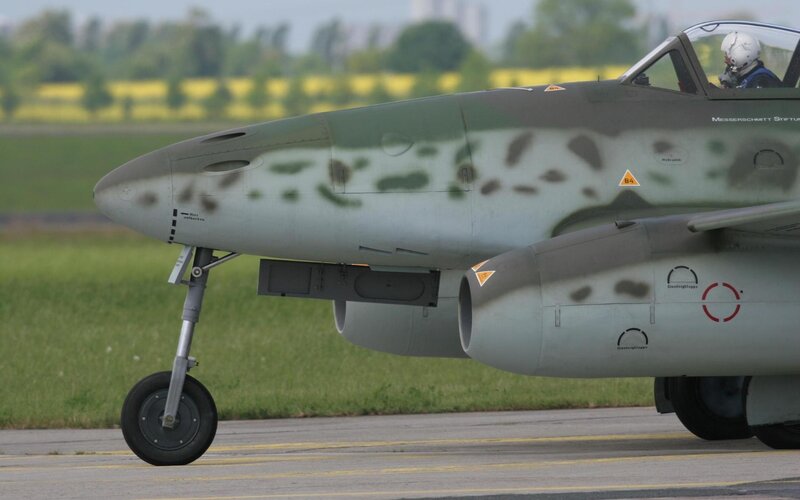 Military Jet on Runway — Green, Calm