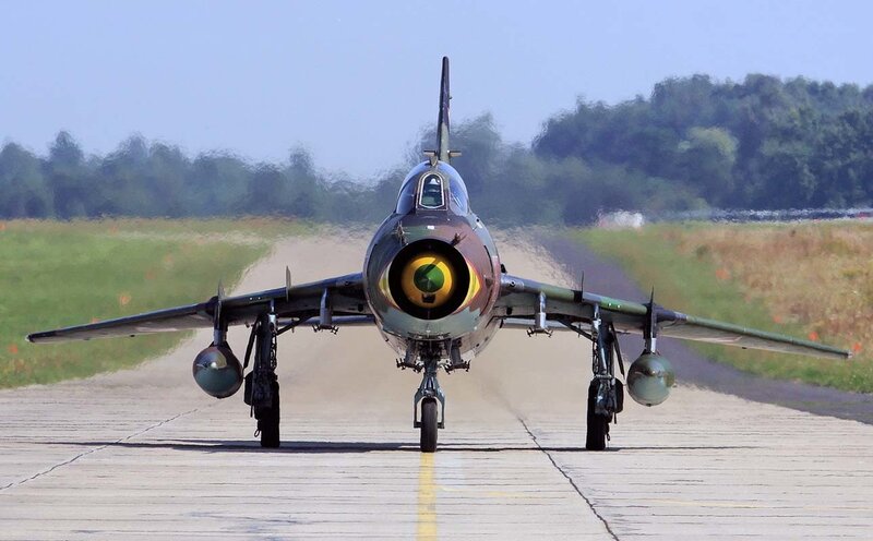 Military Jet on Runway — Green