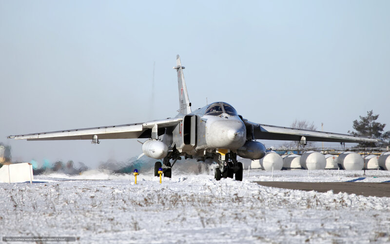 military jet on snowy runway