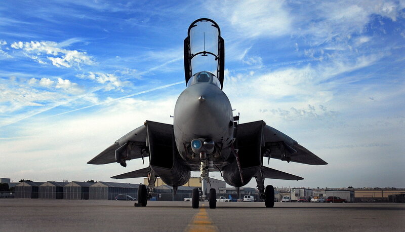 Military Jet on Tarmac — Blue