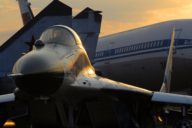 Military Jet on Tarmac — Gold