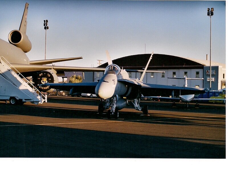 Military Jet on Tarmac — Gray, Calm